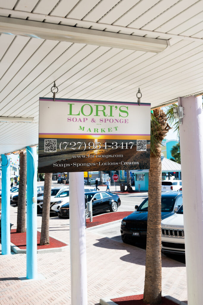 Lori's Soap & Sponge Market sign on the boardwalk at John's Pass, Madeira Beach